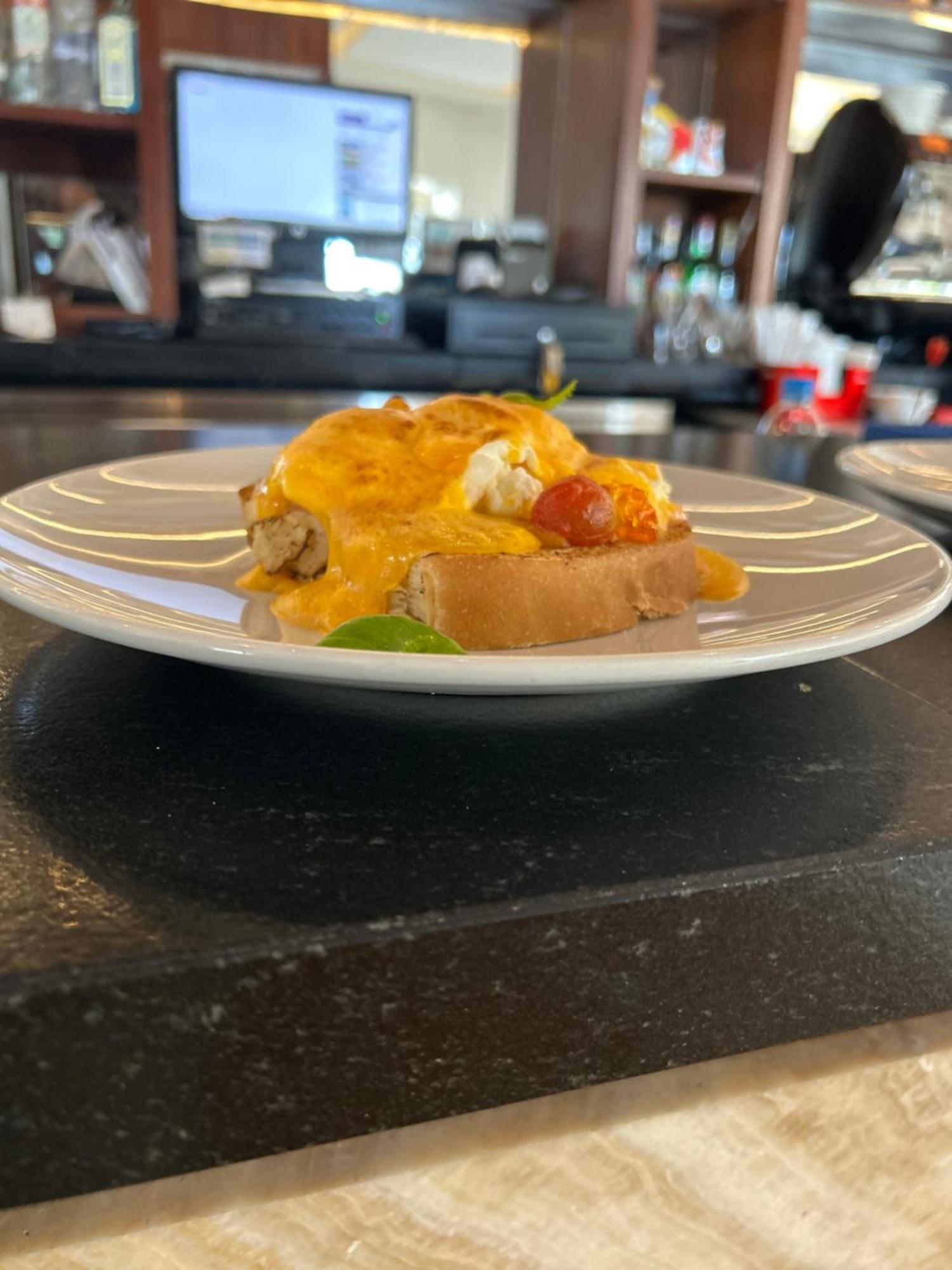 Hacienda Samana Bay Hotel Exterior photo Scrambled eggs with cheese and tomato